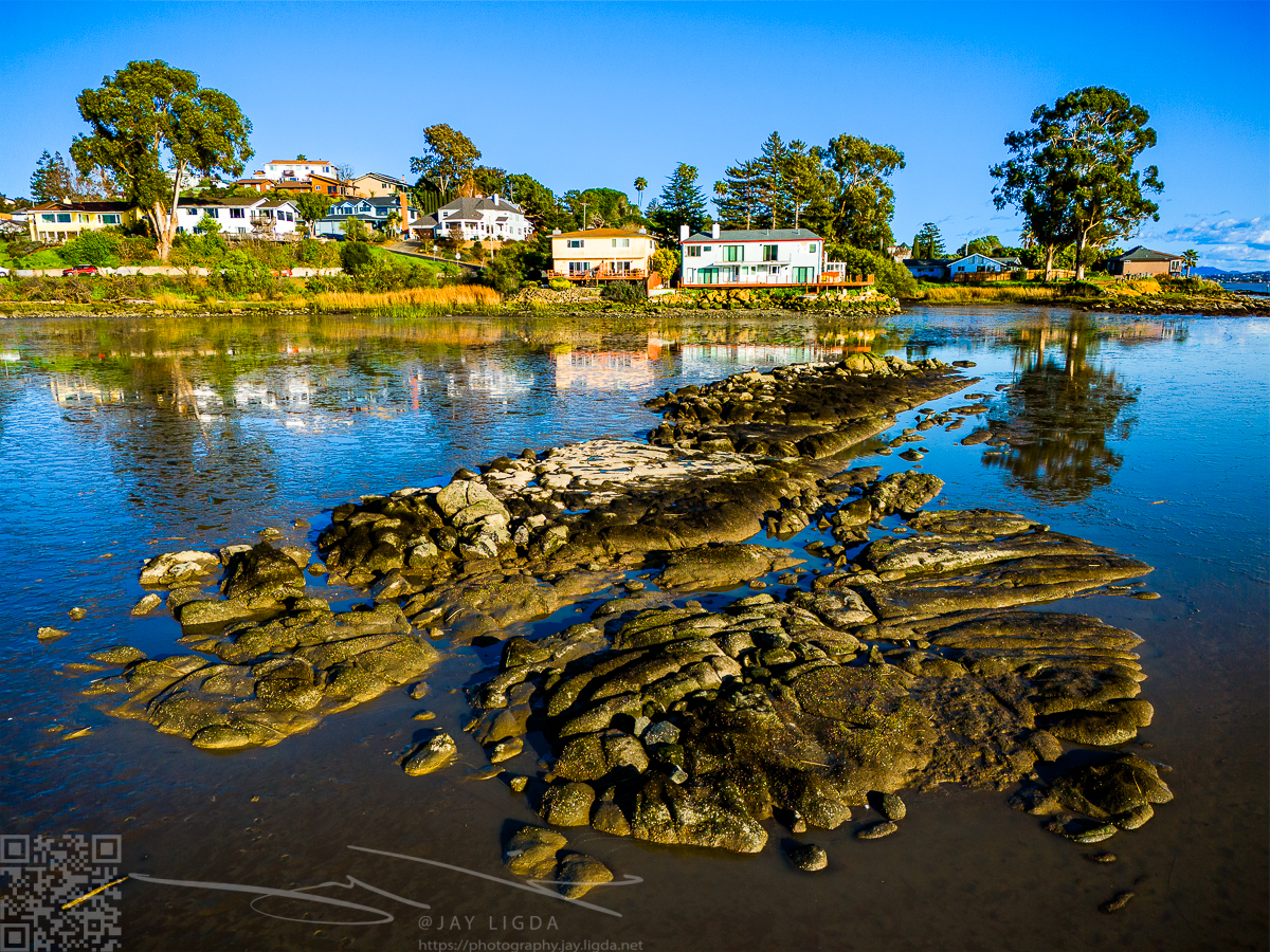 Evening Light on Sandbar and Houses