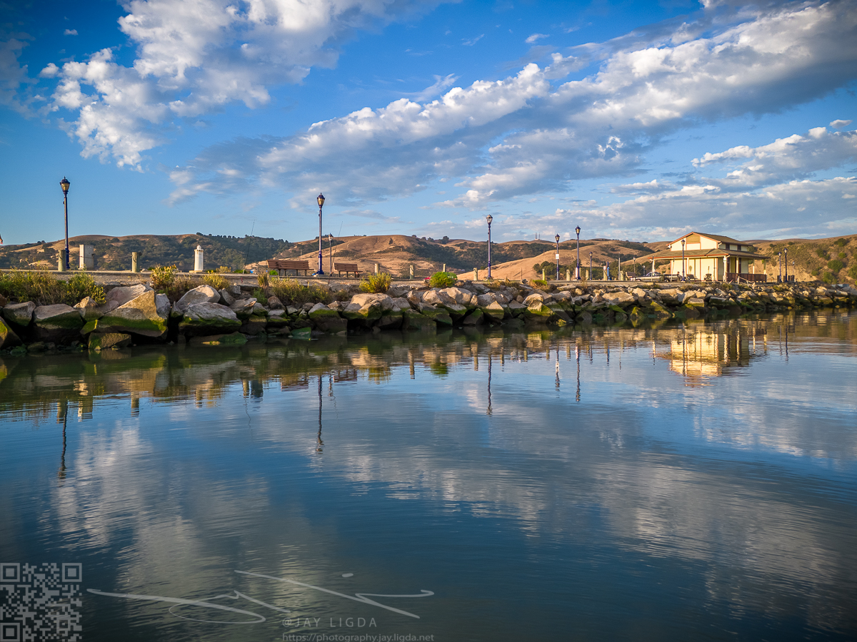 Benicia First Street Pier Behind Shimmering Reflections and Clouds