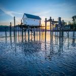 Boathouse on Stilts at Low Tide