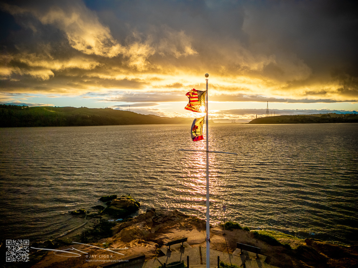 Firey Sunset Behind Flags