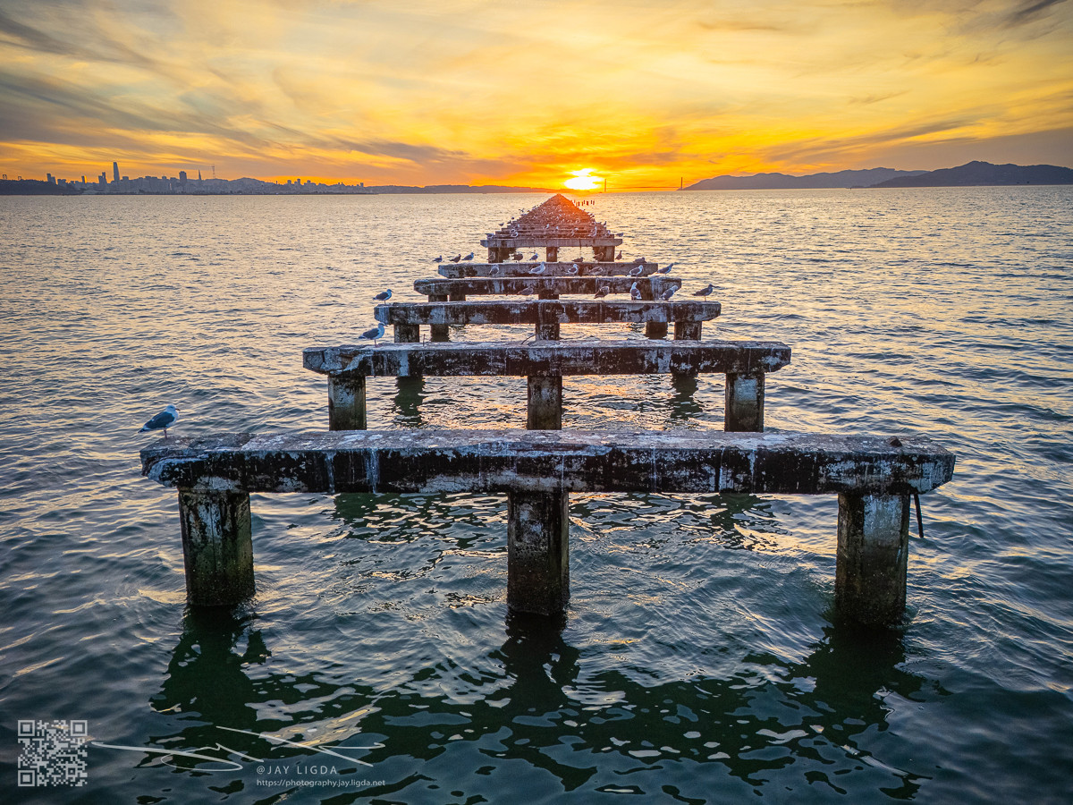 Sun Sets at the End of a Dilapidated Pier Sun Sets at the End of a Dilapidated Pier