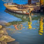 Old Rowboat and Water Reflections