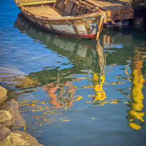 Old Rowboat and Water Reflections
